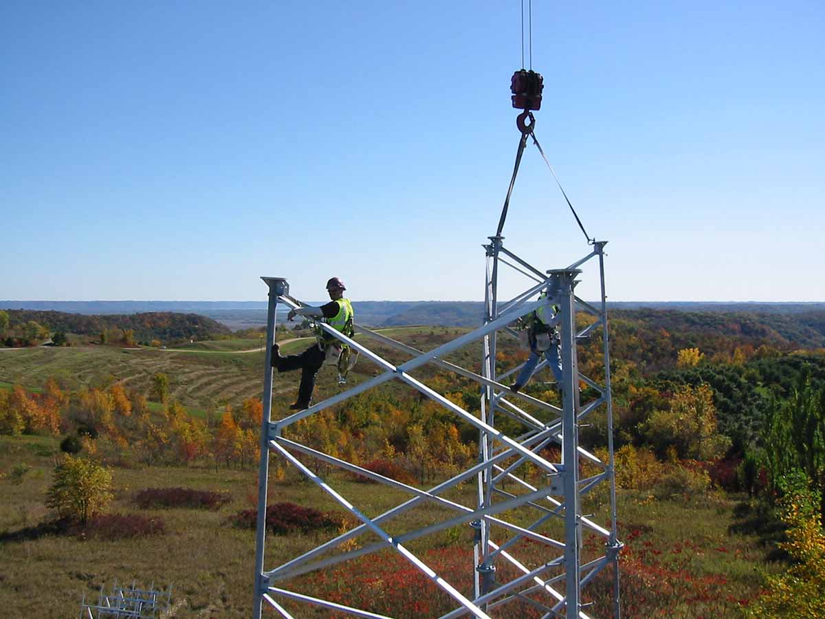 MnDOT worker constructing a radio tower